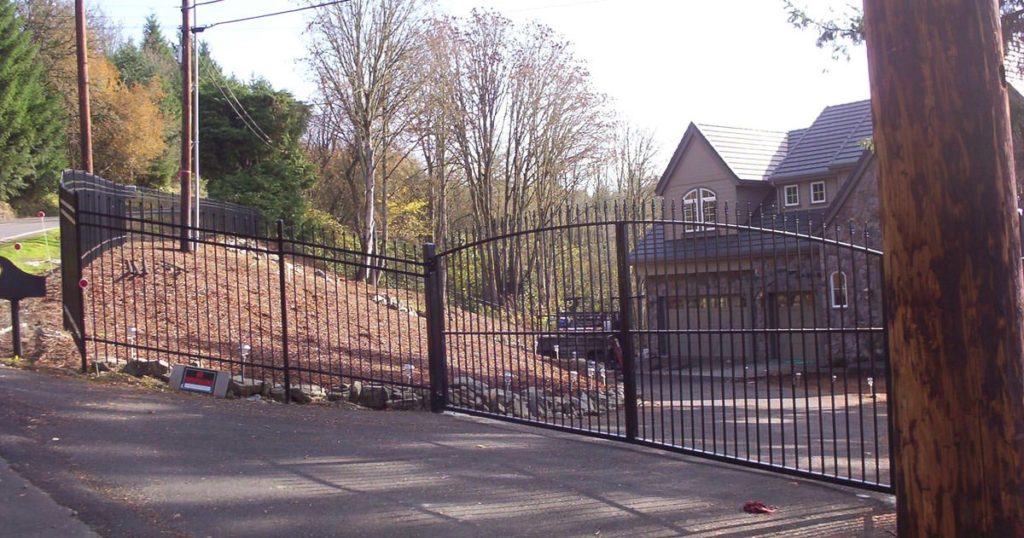 Metal Gate in Front of House