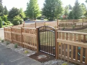 Custom Fence and Gate with different types of fence posts 