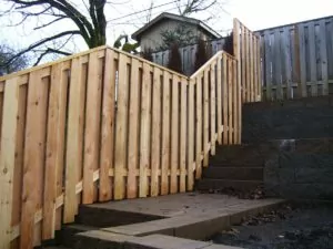 Wooden fence built on a slope