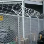 Chain Link Fence vs Wood Fence: Which Is Right for Your Property?